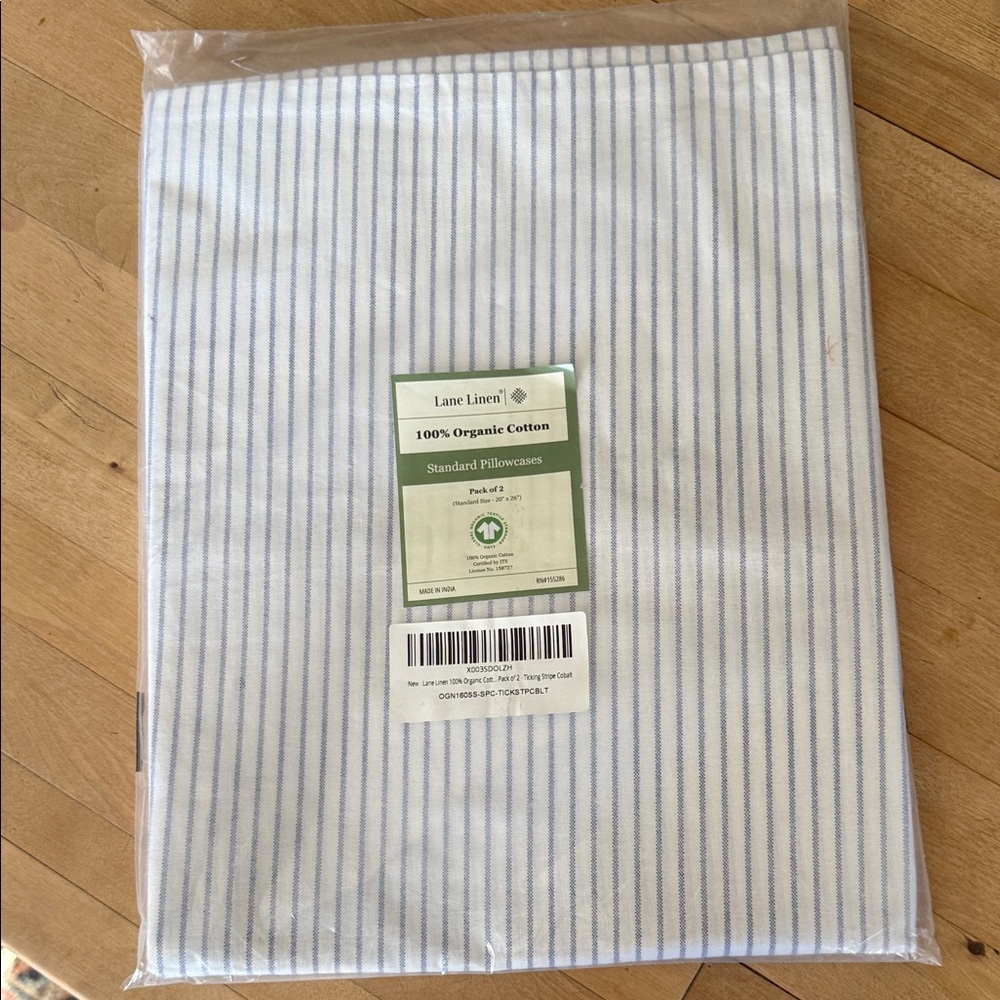 A set of two Blue Striped Pillowcases in 100% organic cotton. 20”x26”. New.
